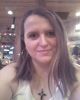 At Hooter's. Still in Vegas. Definitely drunk :D And hungover from last night hence the bags. You gotta take the bad with the good :P - 